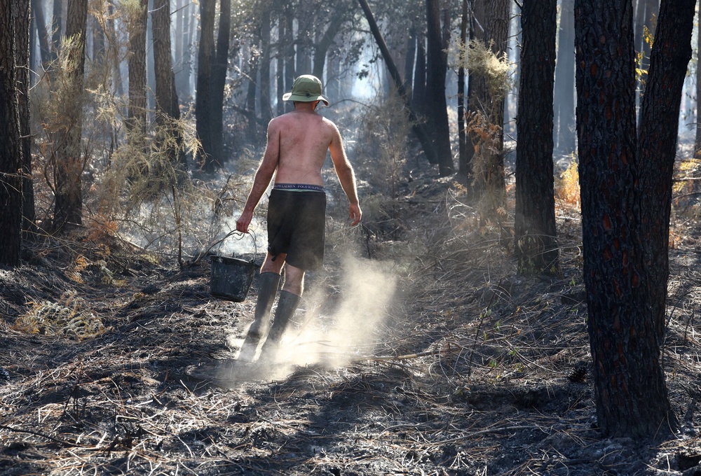Jonathan Segalas-Talous, a pastry chef in the village of Lanton, volunteered to help firefighters (Reuters)