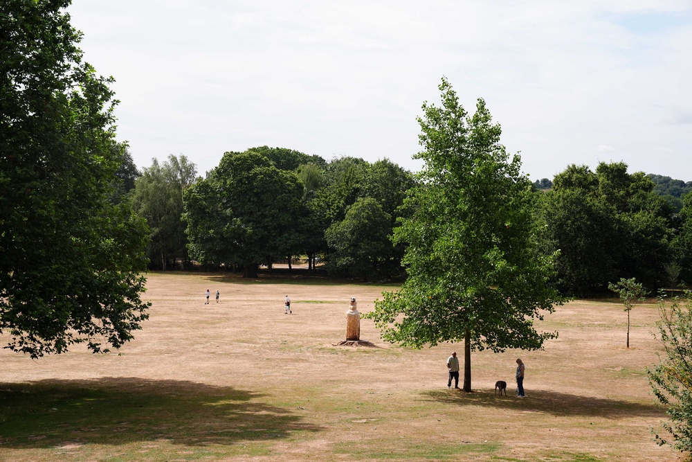 People walk along scorched fields at Bramcote Hills Park in Nottingham, where a dedicated wildfire unit was set up last week following a spate of fires (Jacob King/PA Wire)