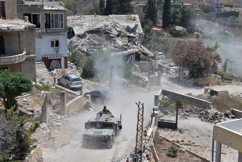 A Lebanese military vehicle drives past homes damaged during the war in the southern village of Zawtar al-Gharbieh, Lebanon (Copyright 2026 The Associated Press. All rights reserved)