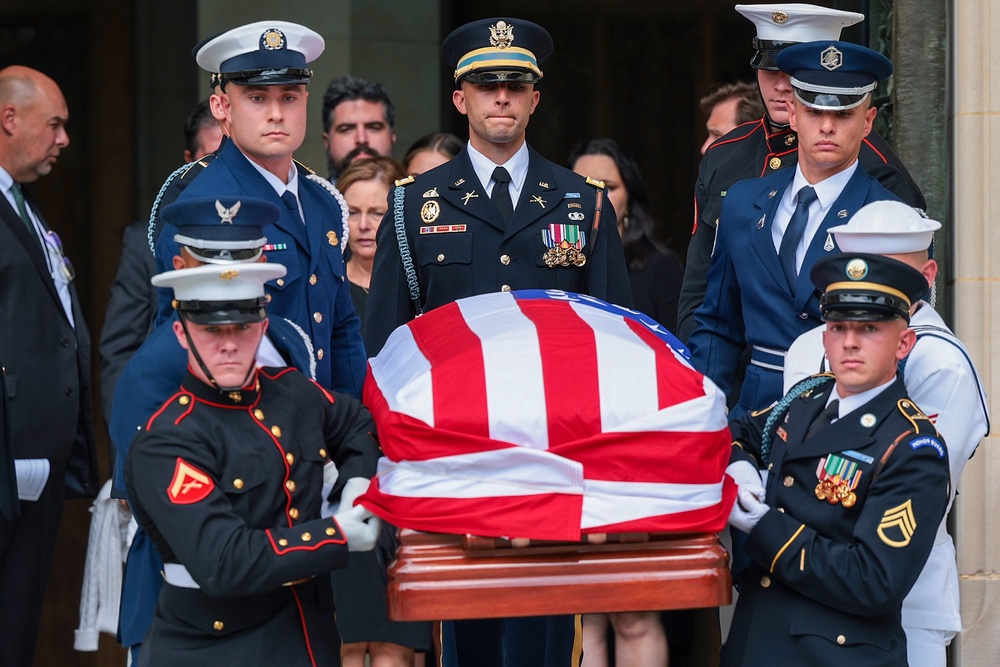 A military body bearer team carries Lindsey Graham’s casket out at the conclusion of the National cathedral after his funeral service Tuesday. (Getty)