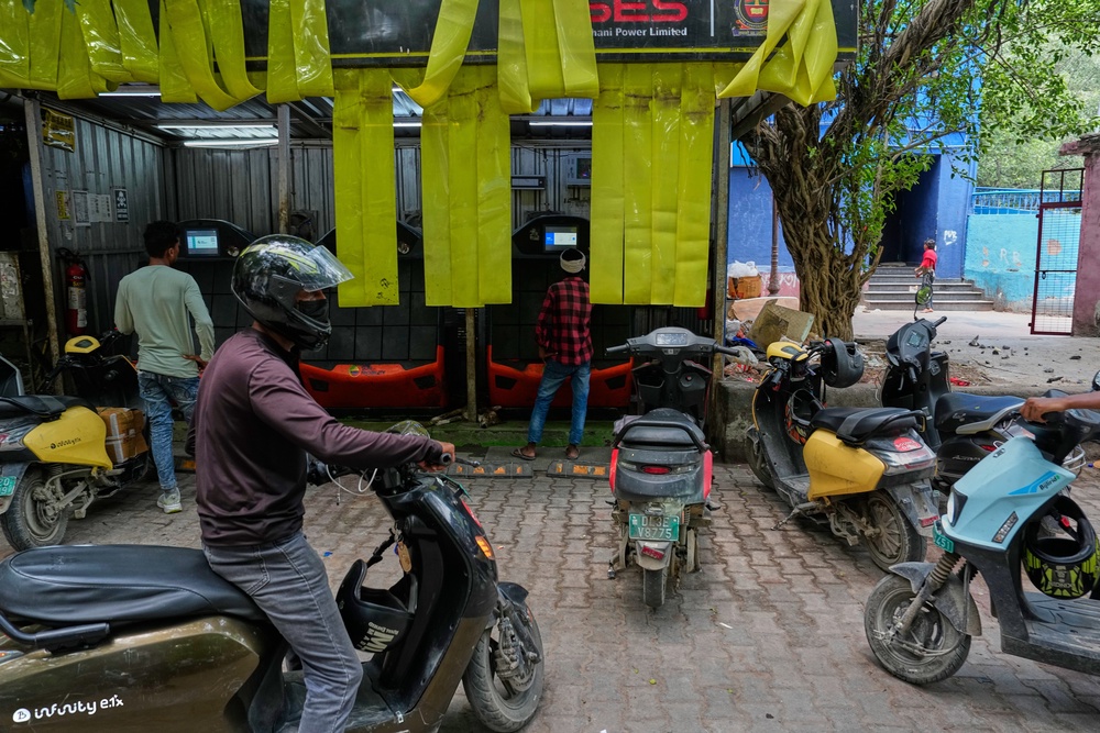 Currently, only about 5 per cent of the 8.7 million vehicles registered in Delhi are electric (Associated Press)