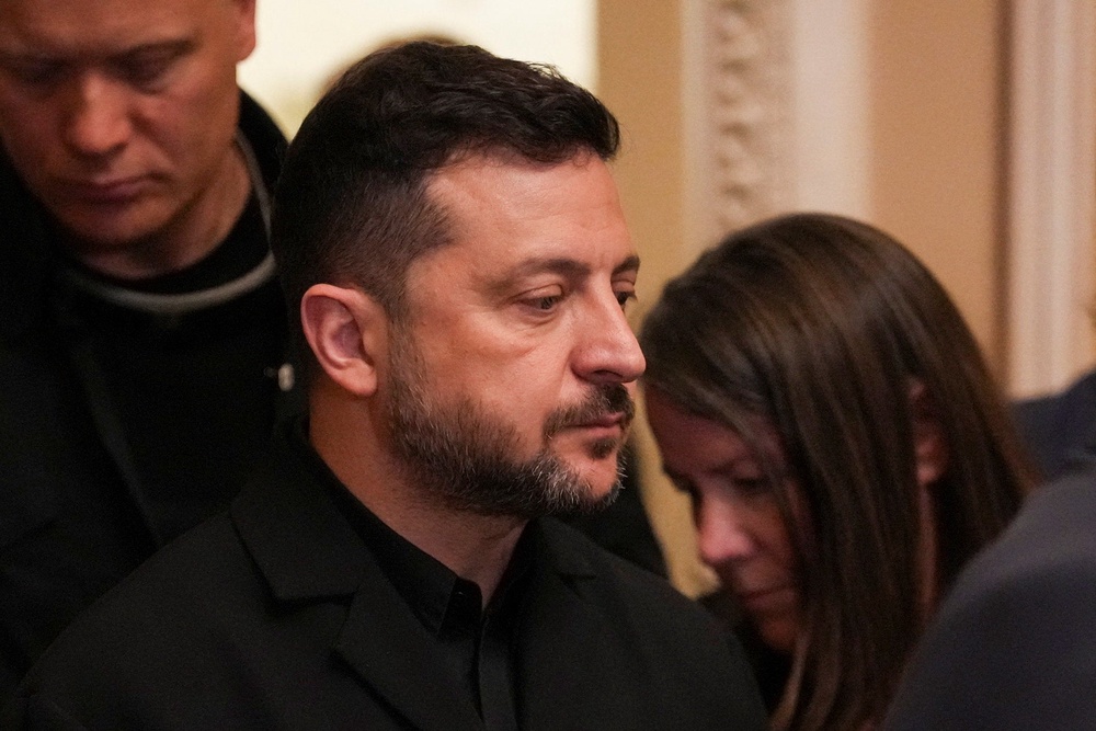 Ukraine's president Volodymyr Zelensky leaves following a meeting with US senators (Reuters)