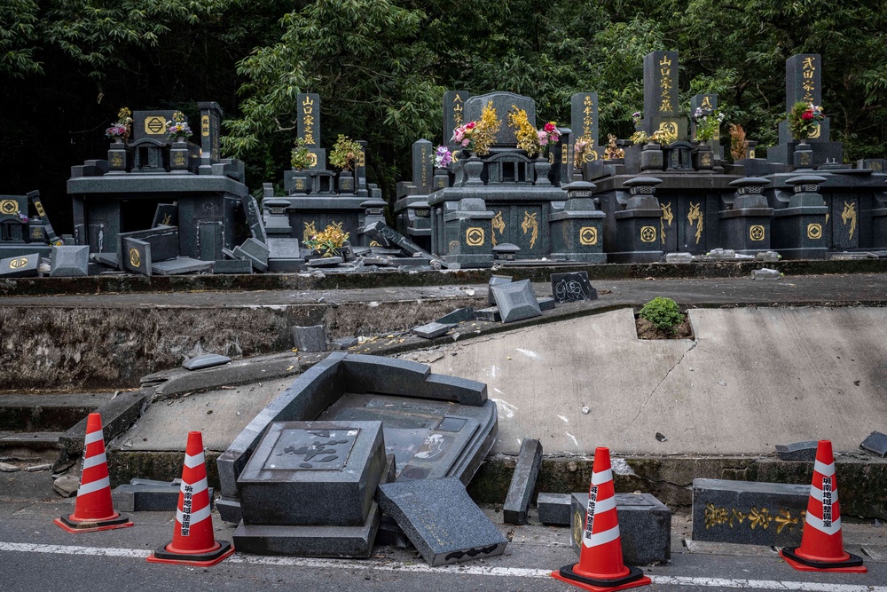 Damaged gravestones are seen in Kumamoto city, Kumamoto Prefecture o (AFP/Getty)