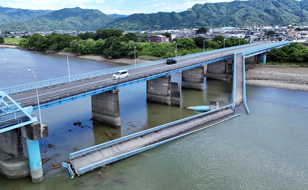 A drone view shows a damaged bridge after an earthquake with a magnitude of 7.1 struck Japan's southern Kumamoto Prefecture, in Yatsushiro (Reuters)