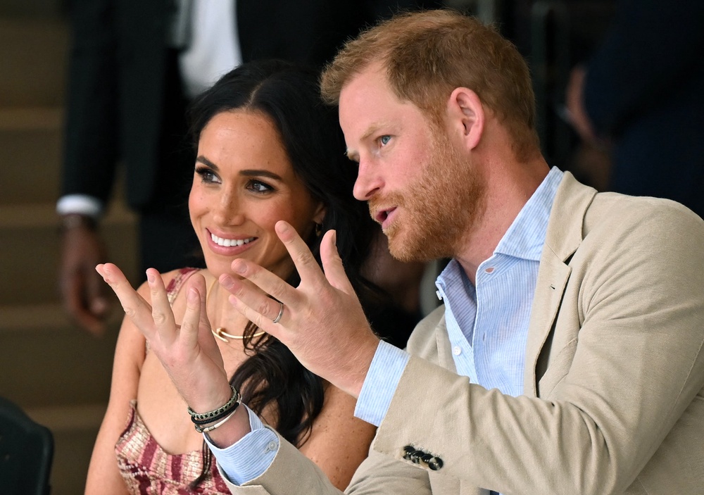 Prince Harry , pictured with Meghan Markle, is fifth in line for the throne (AFP/Getty)