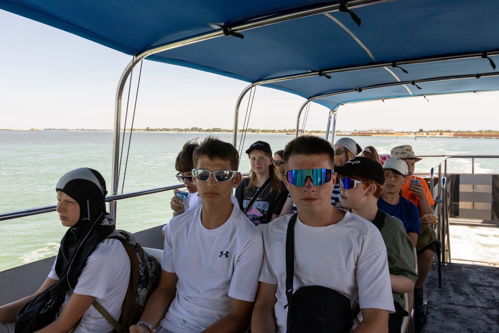 Yevhen, middle, and Vlad, right, on a boat during their holiday to Italy (Hope for Ukraine)