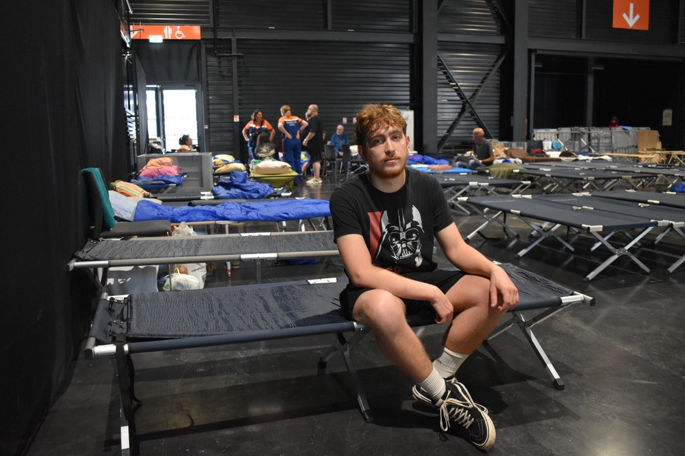 Gabin Bourdin Marchand, a 20-year-old nurse, returned to the site to volunteer his help on Tuesday, after being evacuated himself (James Reynolds / The Independent)