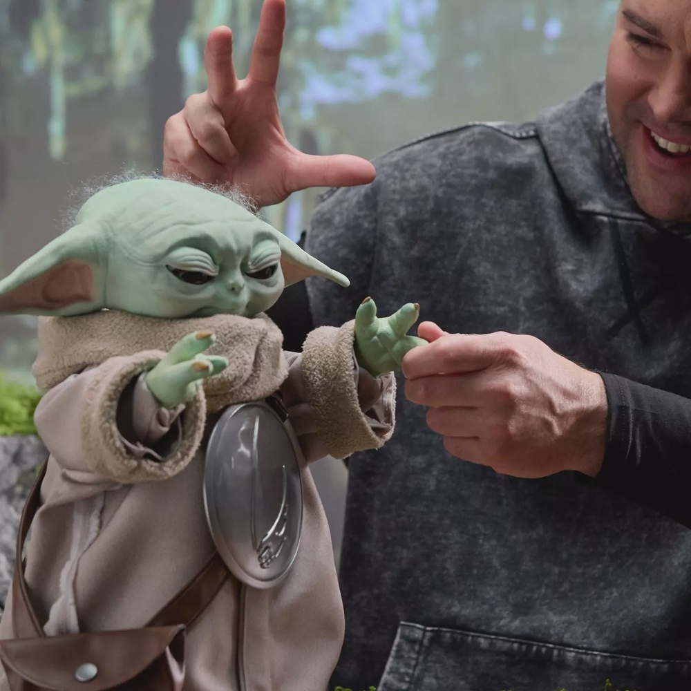 Ultimate Grogu features more than 250 animations, using 14 sensors to respond to touch and movement with lifelike reactions like blinking, ear wiggles and Force-inspired gestures (Hasbro)