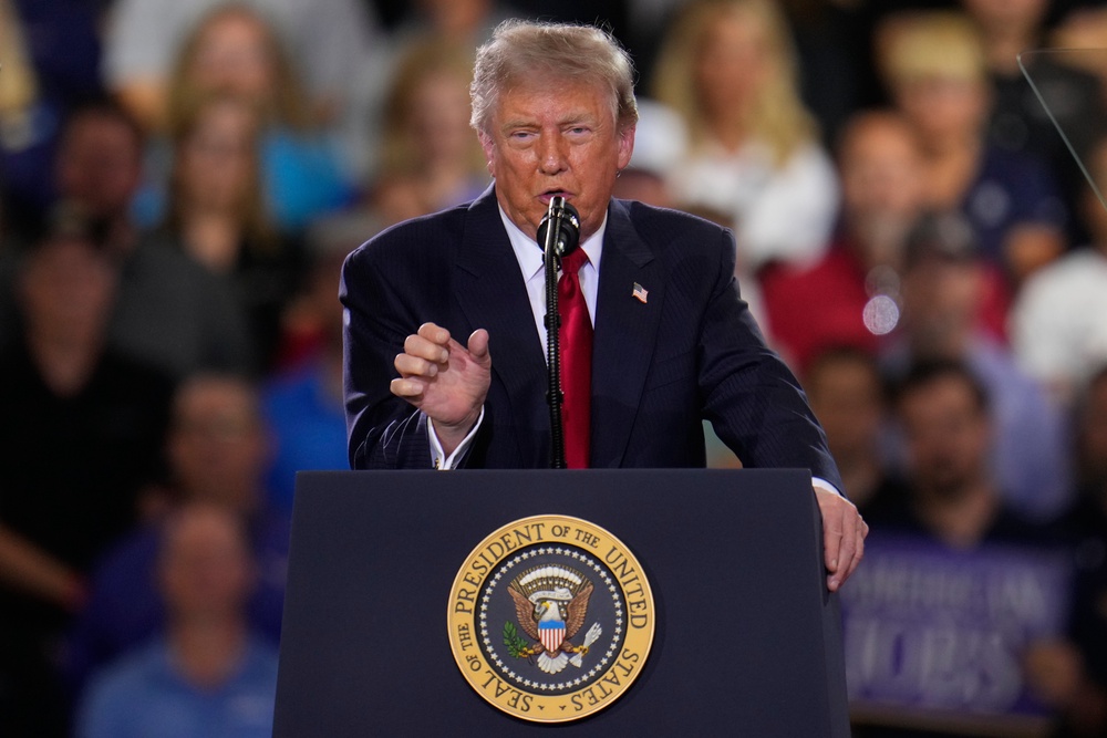 The US president says Iran will be hit ‘hard’ (Paul Sancya/AP) (AP)