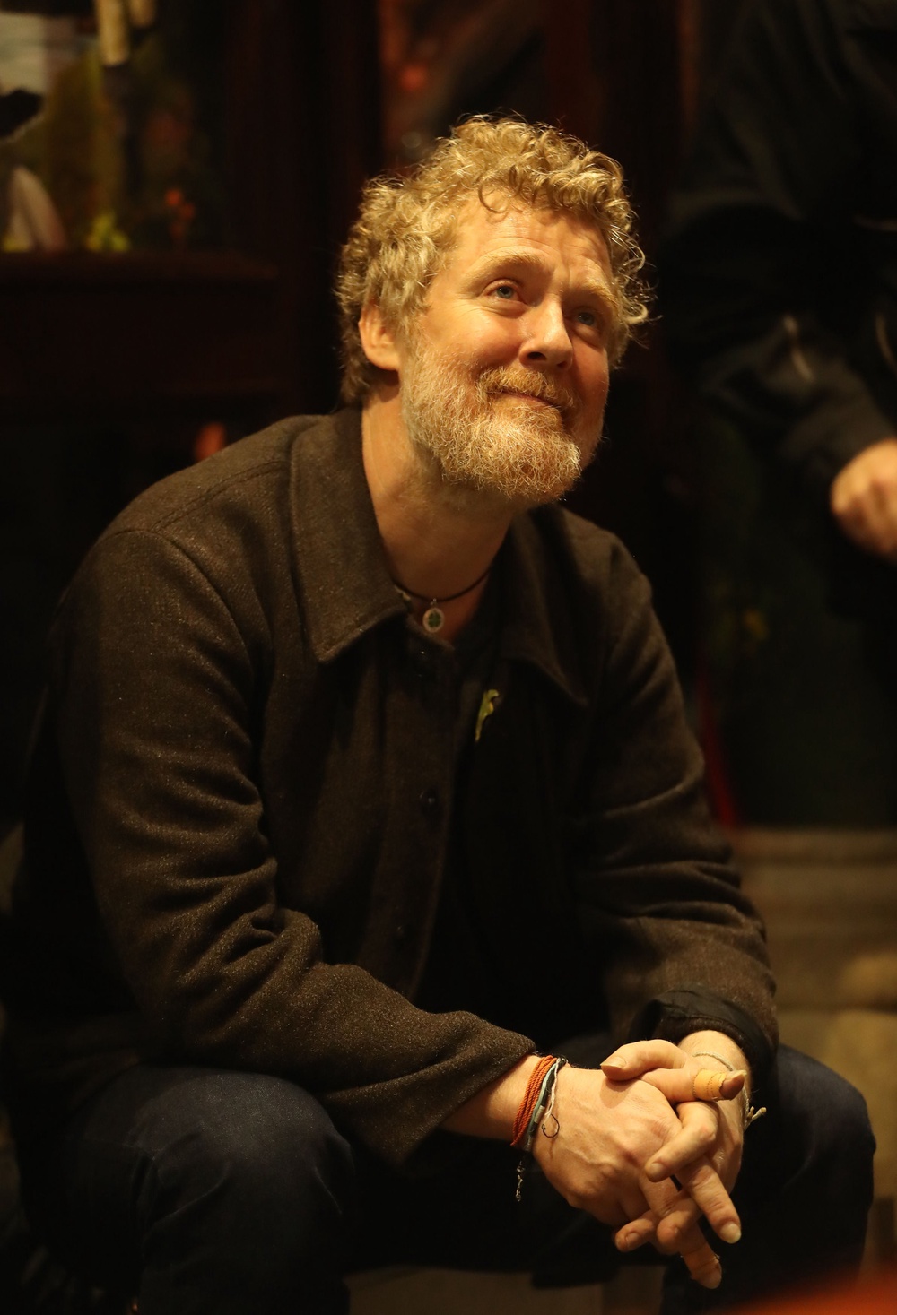 Glen Hansard taking part in the annual Christmas Eve busk in aid of the Dublin Simon Community outside the Gaiety Theatre in Dublin (Niall Carson/PA) (PA Wire)