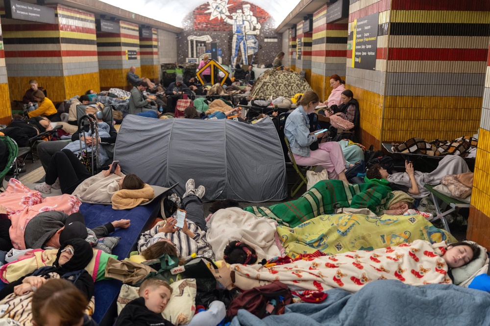 People take shelter at a metro station during Russian missile strike on Kyiv on Thursday (AFP/Getty)
