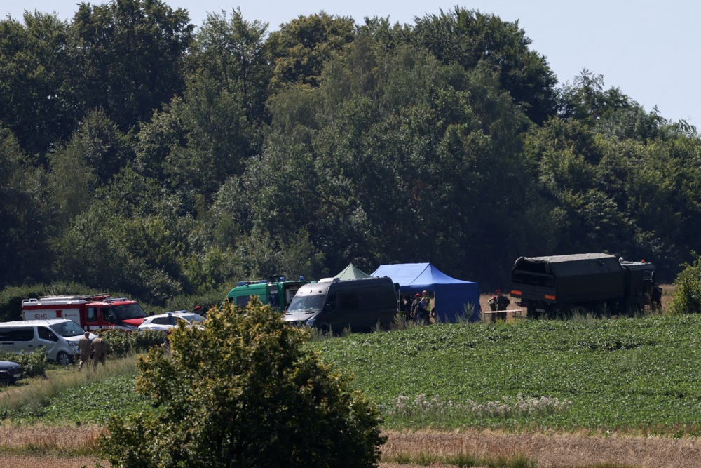 Polish emergency services have arrived at the site to determine the cause of the crater (Reuters)