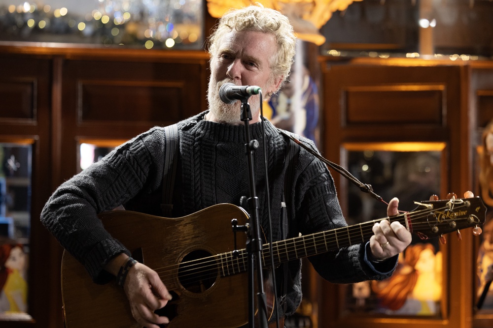 Glen Hansard busking in Grafton Street in December (Conor O Mearain/PA) (PA Archive)