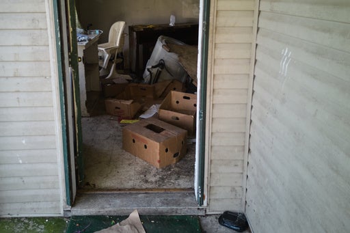 Police described parts of the house that were inaccessible due to the trash accumulation inside (AP)