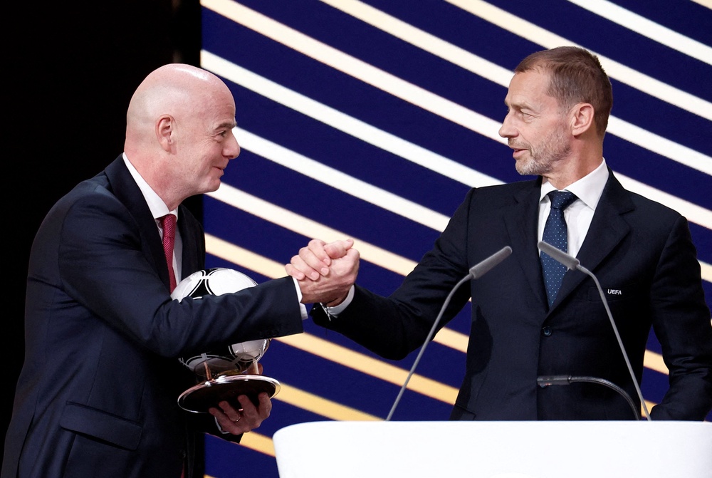 Uefa president Aleksander Ceferin, right, has gone to war with Fifa president Gianni Infantino (Reuters)