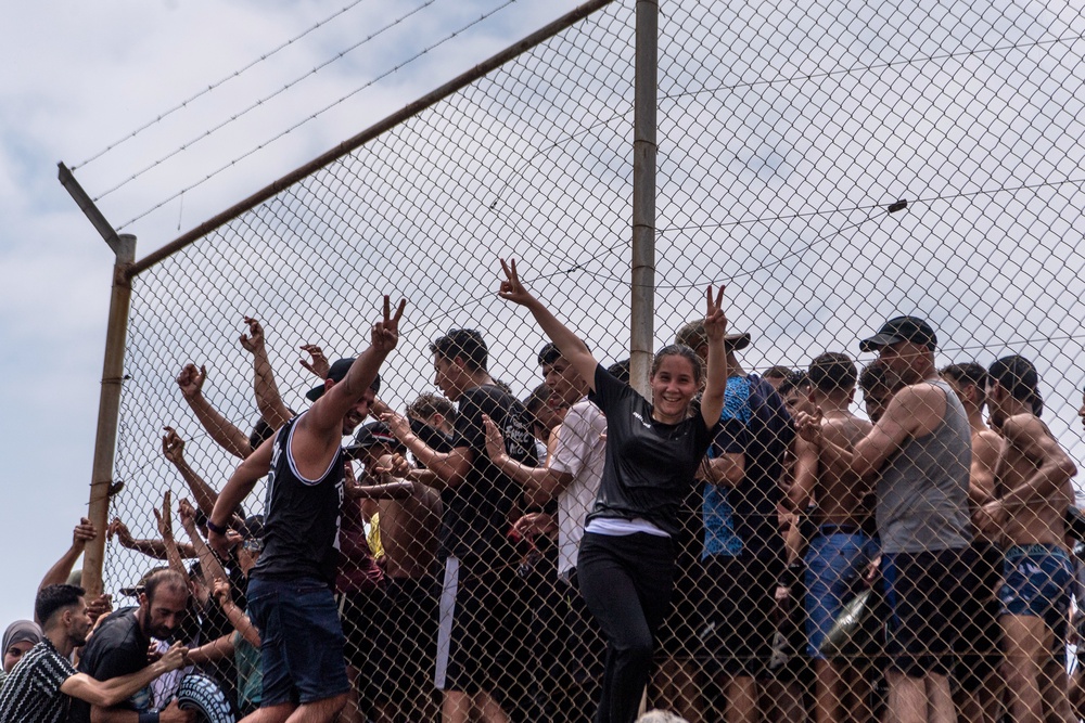 A local shopkeeper said that when the fence was breached after midnight, hundreds of migrants rushed through in a matter of minutes (AP)
