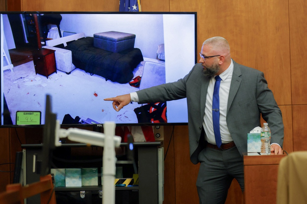 Hall said they arrived to find Patrick Clancy yelling for help from behind the home (CJ Gunther/Pool via REUTERS)