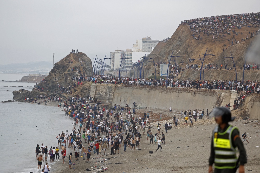 Thousands crossed overnight from Morocco into Spain's north Africa's Ceuta enclave (Photo by Abdel Majid BZIOUAT / AFP via Getty Images) (AFP/Getty)