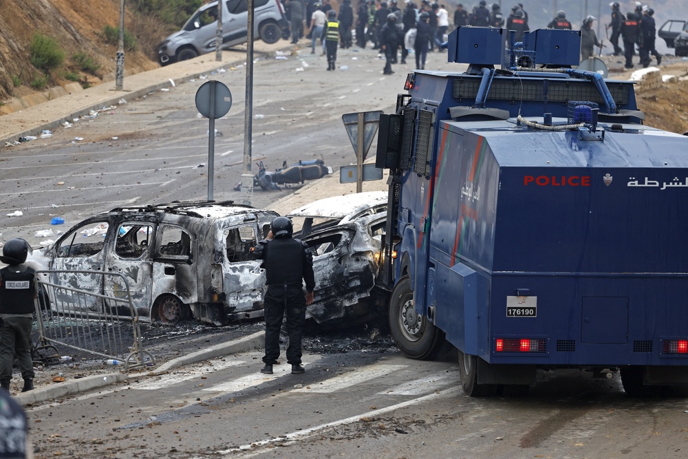 Members of Moroccan security forces gather at the site of clashes near Fnideq, on the Morocco-Spain border, on July 31, 2026 (Photo by Abdel Majid BZIOUAT / AFP via Getty Images) (AFP/Getty)