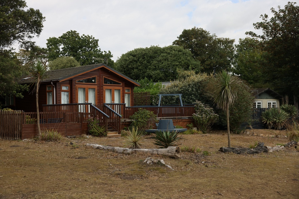 Cottages sit empty after people were evacuated from the holiday park (Reuters)