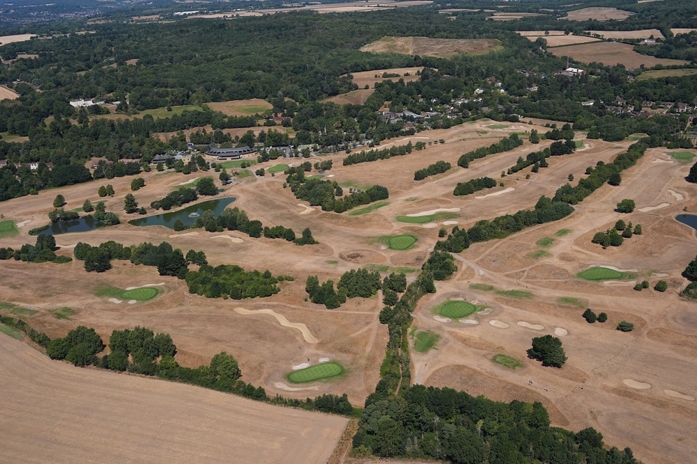 Aerial view of a golf course near Ascot as the heatwave continues. Swathes of England are suffering from 