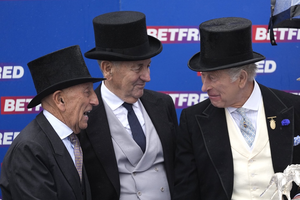 Betfred owners Fred Done (left) and Peter Done with Charles (right) after the Betfred Derby (Andrew Matthews/PA) (PA Wire)
