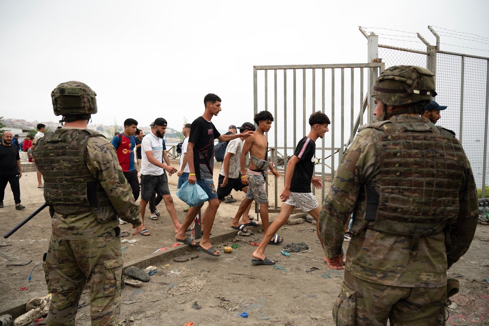 Migrants cross back to Morocco after they crossed the border to enter Spain's north Africa's Ceuta enclave on July 31, 2026. (Photo by JORGE GUERRERO / AFP via Getty Images) (AFP/Getty)