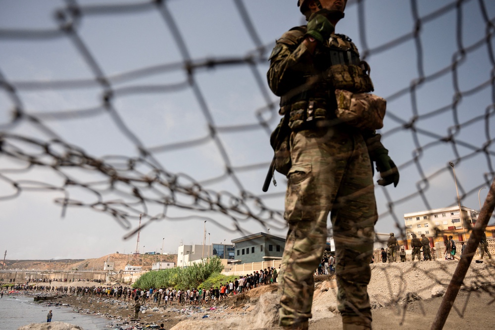 Many of the migrants have been sent back after the border breach (AFP/Getty)