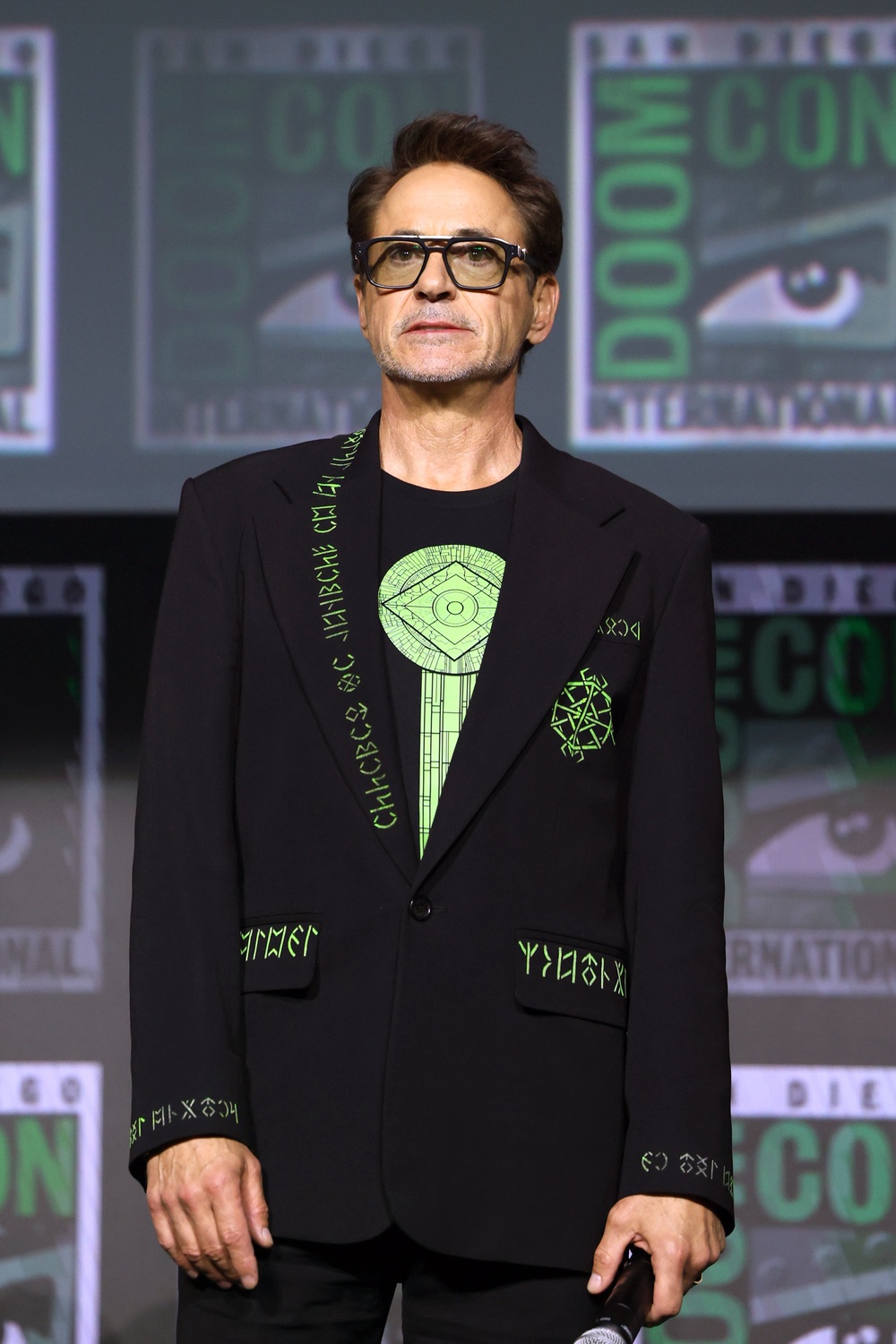 Robert Downey Jr. wearing a jacket covered in runes at an 'Avengers: Doomsday' event at San Diego Comic-Con in July 2026 (Getty)