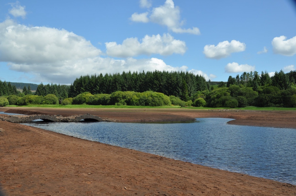 Low water levels at the Llwyn-On reservoir in South Wales revealed an old stone bridge (Eleanor Storey/PA) (PA Wire)