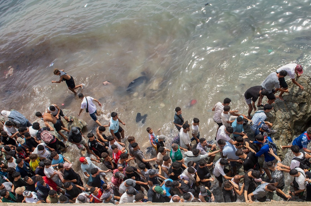 The vast majority of migrants have now returned to Morocco, Spain said (AP)