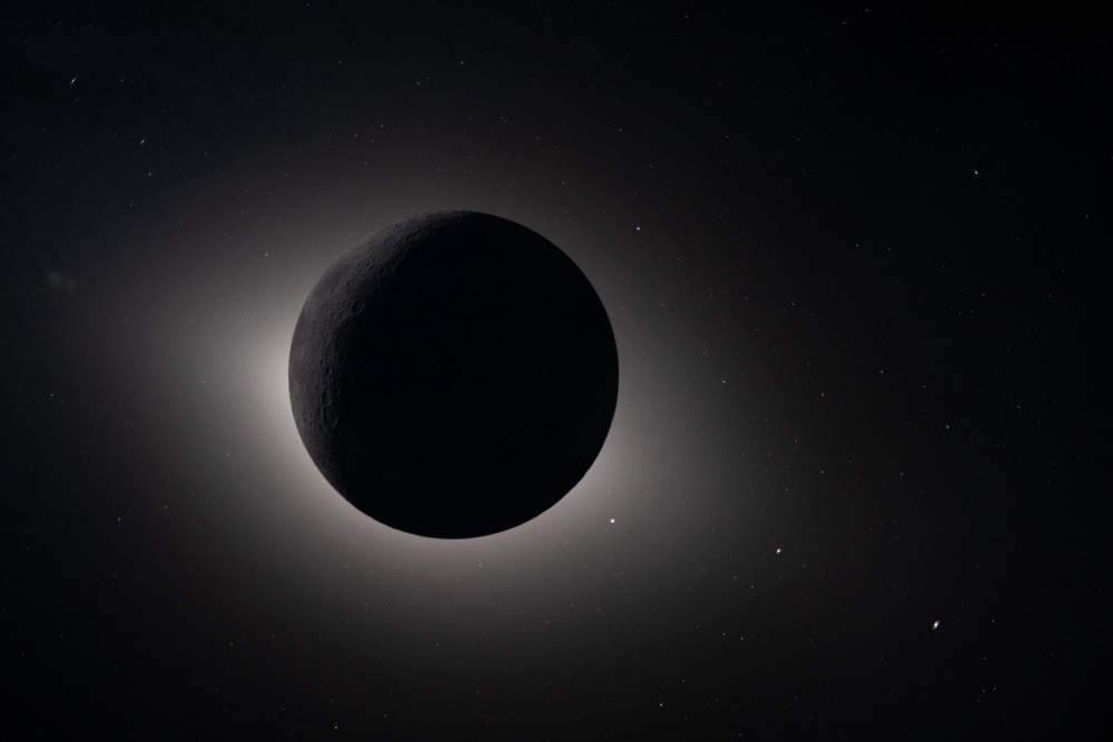 FILE - This image provided by NASA and captured by the Artemis II crew from lunar orbit, April 6, 2026, shows the Moon eclipsing the Sun. (NASA via AP, File)