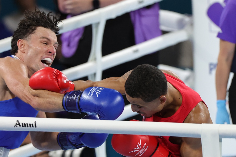 Jon McConnell of Northern Ireland (left) en route to a Commonwealth Games gold medal against Orlando Holley-Sotomi of Wales (Steve Welsh/PA). (PA Wire)