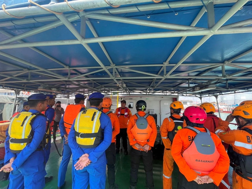 Rescue workers prepare for a search and rescue operation following a deadly fire on a ferry off Madura island in Surabaya, Indonesia (Reuters)