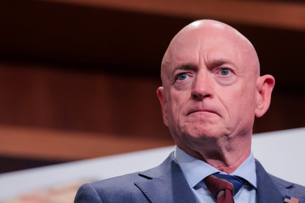 Sen. Mark Kelly urged Donald Trump to ditch his two top negotiators on Sunday (Getty)