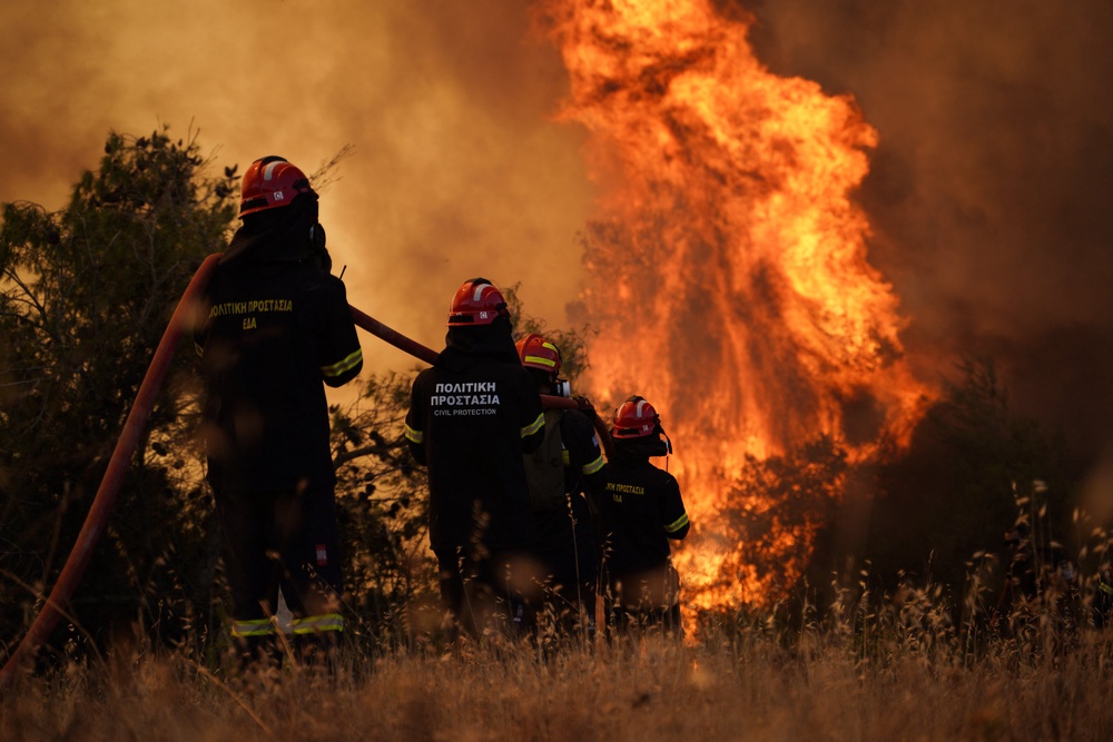 Firefighters were battling the flames all day and into the night (AFP/Getty)