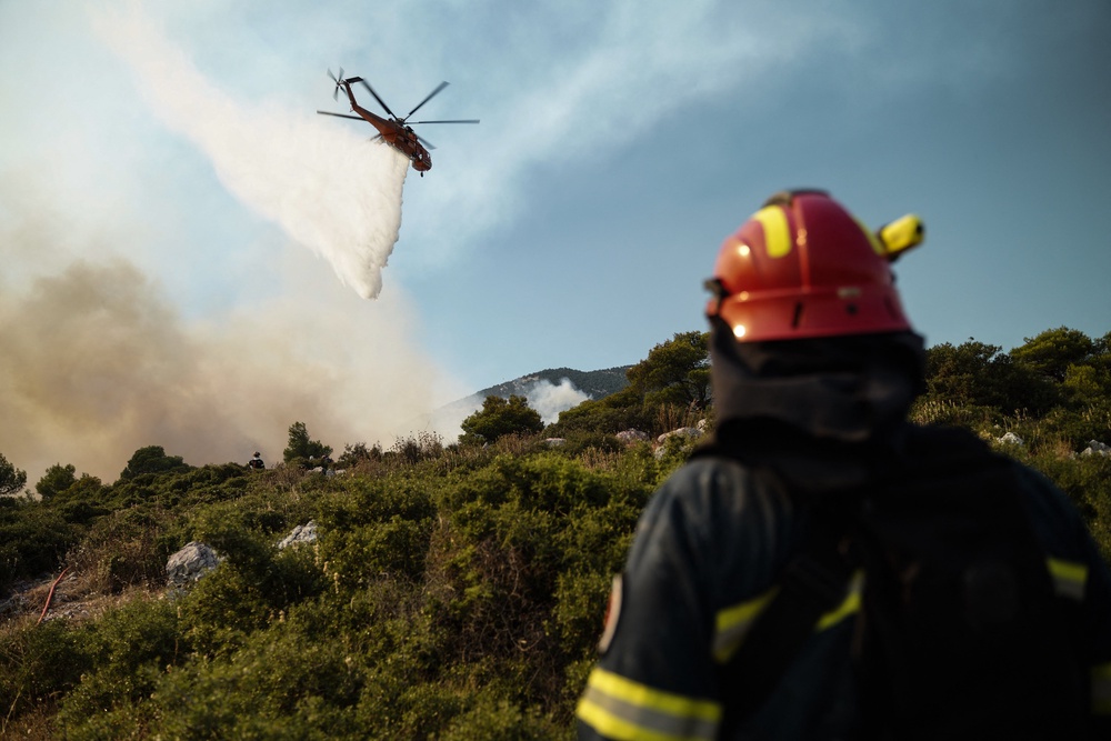 The Greek president said the crash showed the dangers firefighters are currently facing (AFP/Getty)