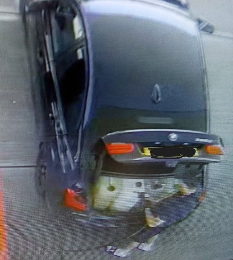 A person filling fuel into plastic containers at a petrol station in Kent (Forecourt Eye/PA)