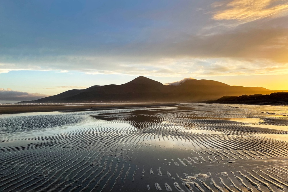 Murlough Beach sits at the foot of the Mourne Mountains (Getty Images)