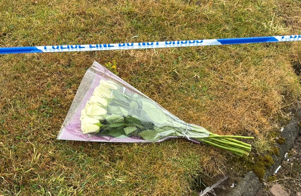 Floral tributes at the Elliot Industrial Estate in Arbroath (Rachel Keenan/PA)