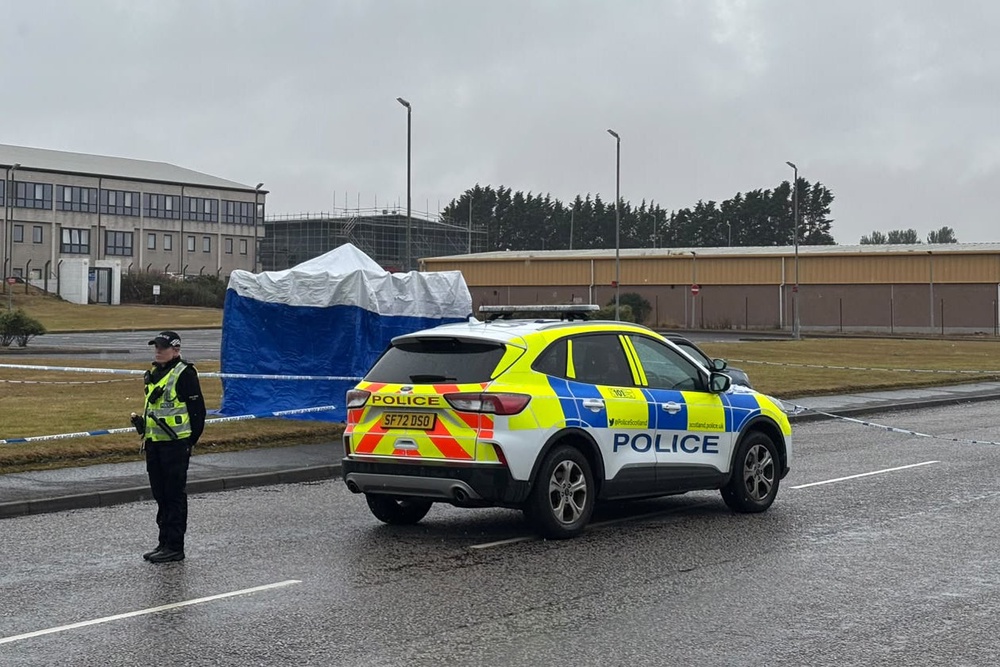 Police at the Elliot industrial estate in Arbroath (PA)
