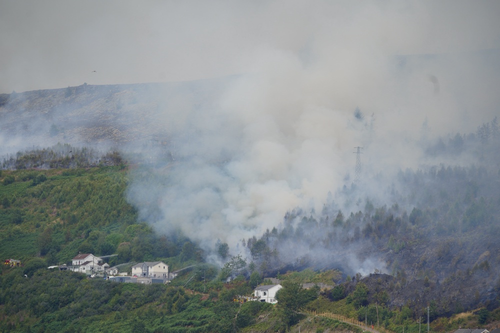 The hot dry conditions have provoked wildfires (Ben Birchall/PA) (PA Wire)