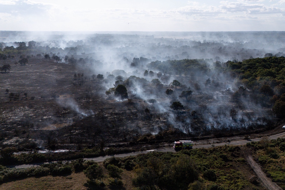 The smouldering remains of a wildfire at Dunwich Heath, near Leiston, on Friday (PA)