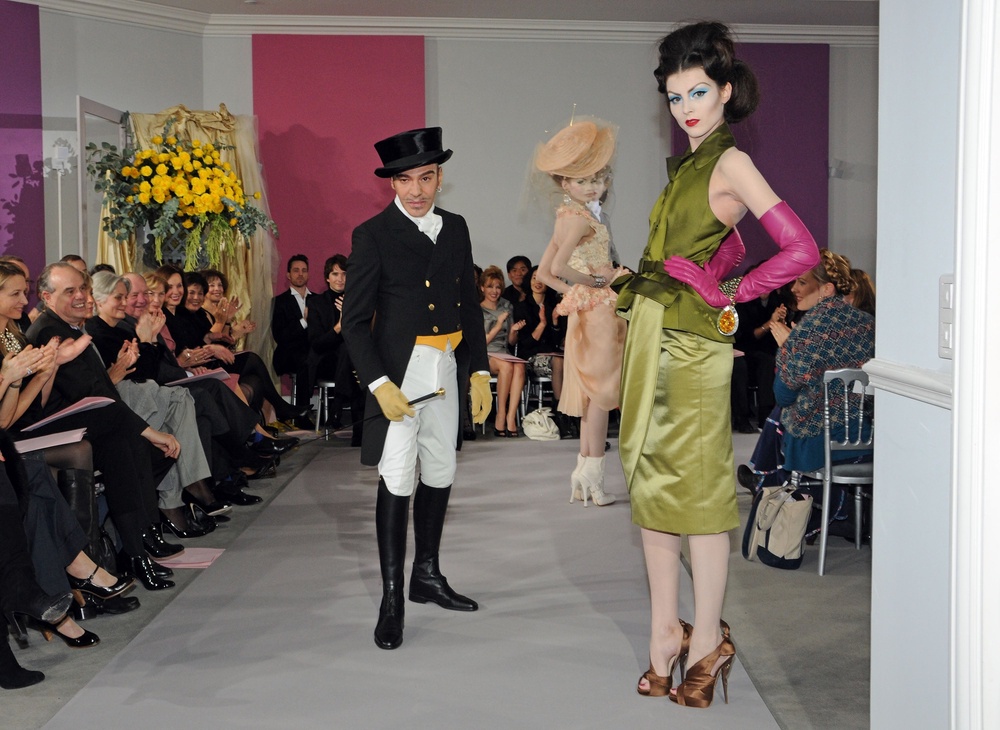 John Galliano, pictured here onstage on the Dior runway in January 2010, lost his position at the fashion house after his antisemitic comments surfaced (Getty Images)