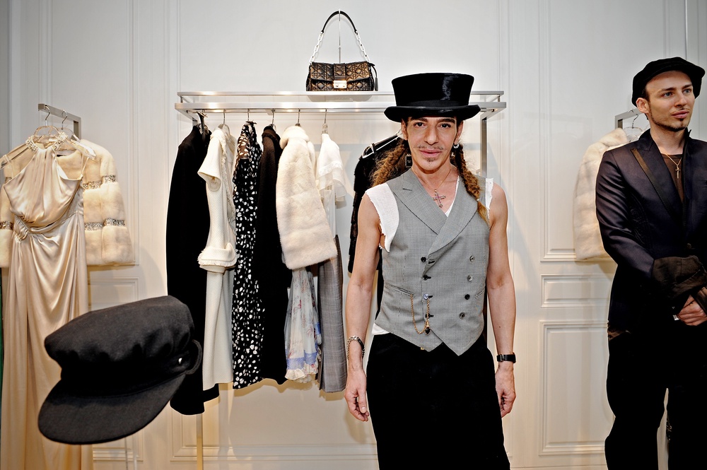 John Galliano, pictured here in a Dior store in Shanghai in 2010, was briefly exiled from the fashion world after his 2011 antisemitic comments surfaced (AFP/Getty)