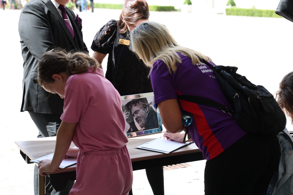 People sign condolence books at a public wake for Glen Hansard at the Irish Museum of Modern Art in Dublin (Damien Eagers/PA) (PA Wire)