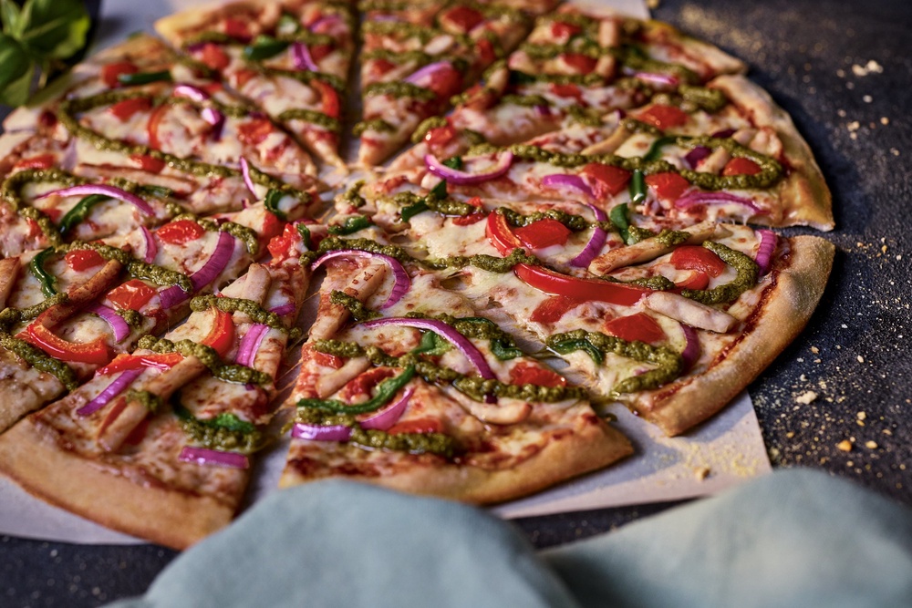 Domino’s recently launched a new range of thinner pizzas (Domino’s/PA) (PA Media)