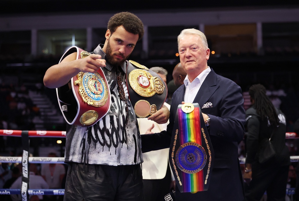 Itauma with his promoter Frank Warren (Getty)