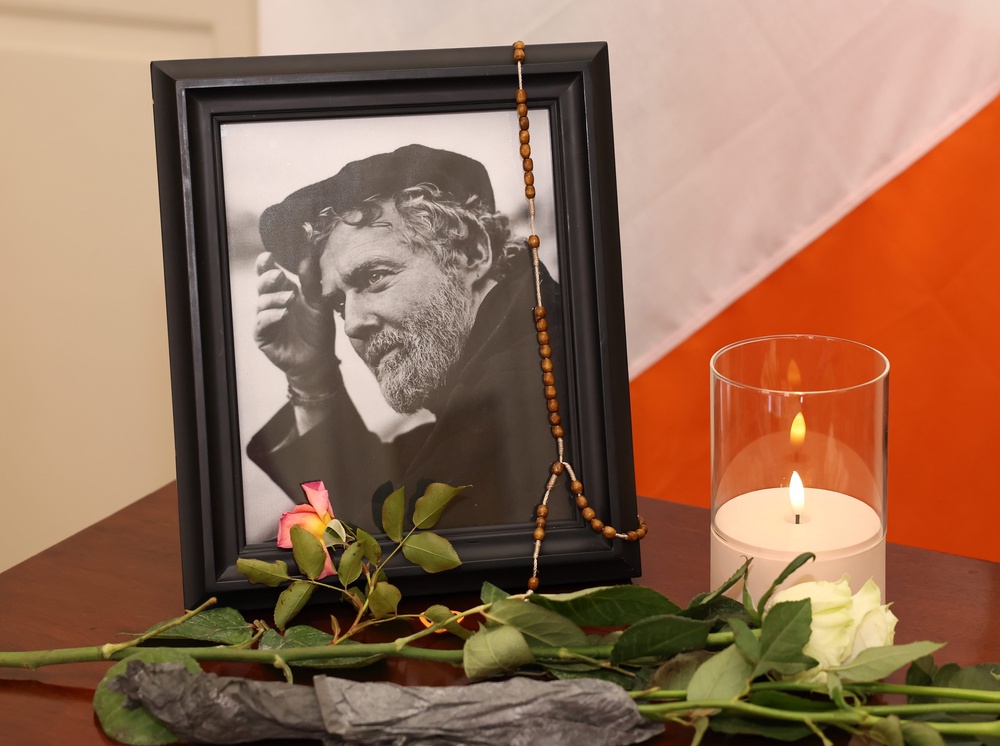 A photograph of Glen Hansard beside the book of condolences at the Mansion House in Dublin (Damien Eagers/PA) (PA Wire)
