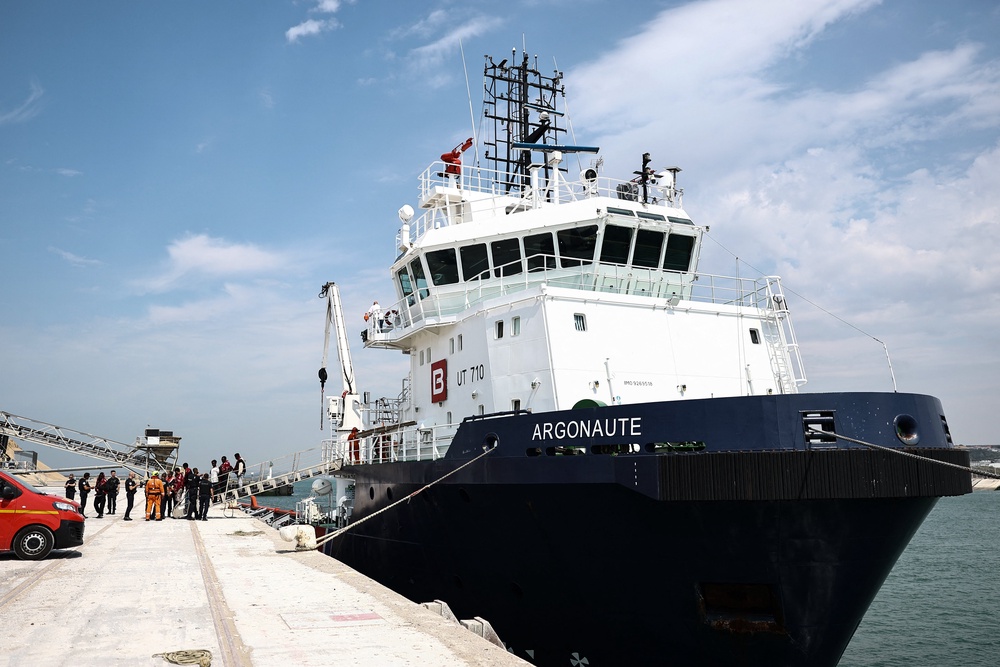 Migrants disembark from the French rescue ship Argonaute following their rescue at sea (AFP/Getty)